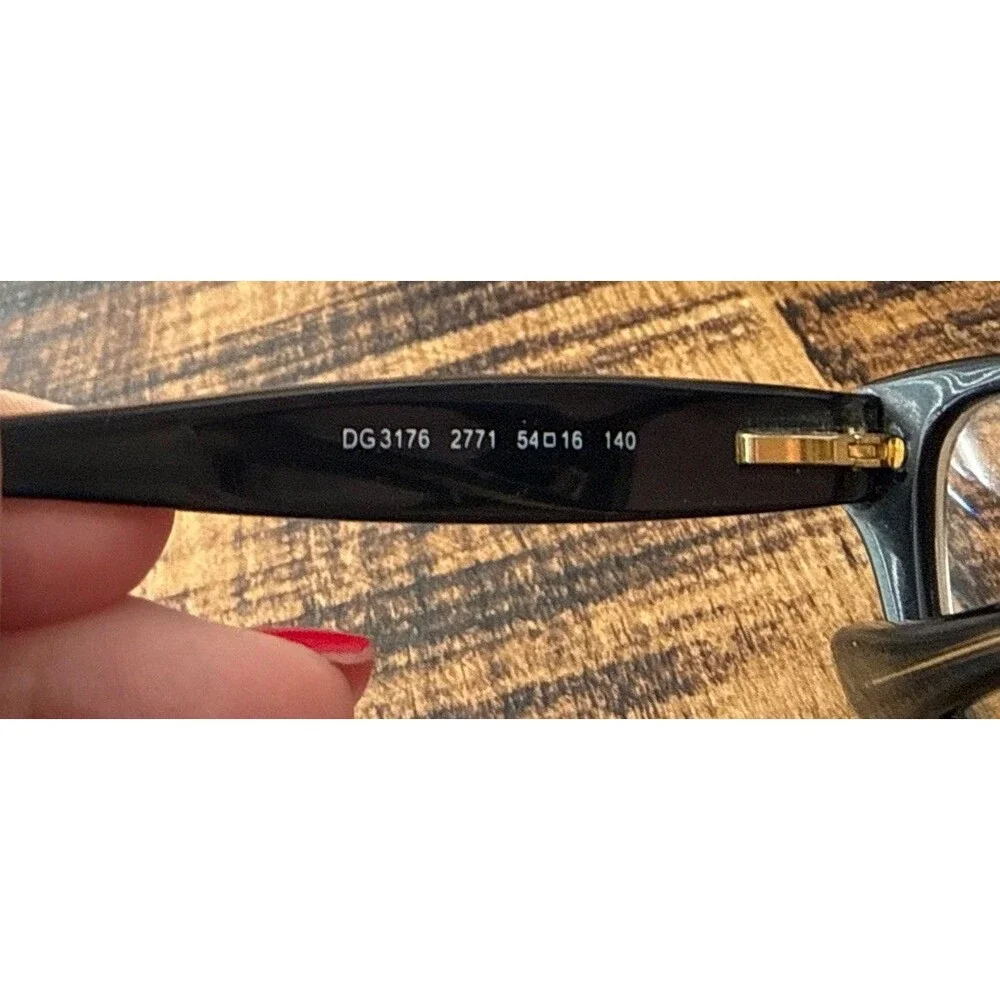 Dolce And Gabbana Eyeglass Frames In A Dark Black with Gold - Frames Only